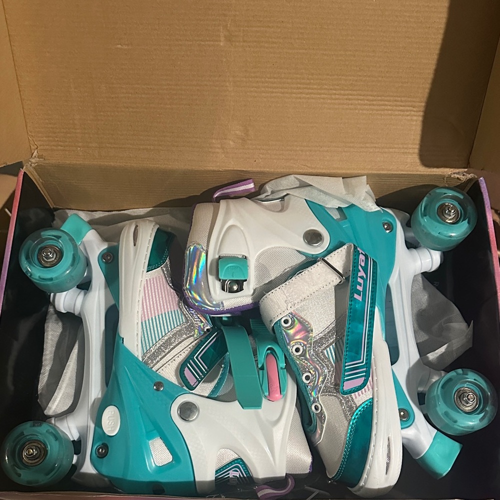 Teal and White Roller Skates